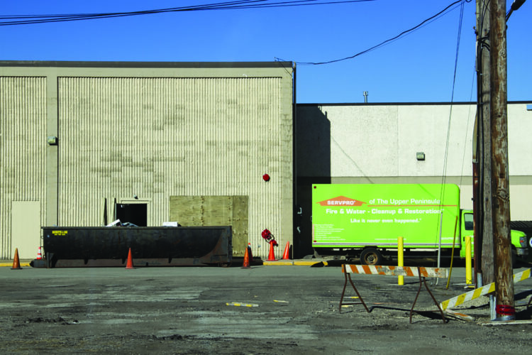 Man who crashed into Escanaba mall dies